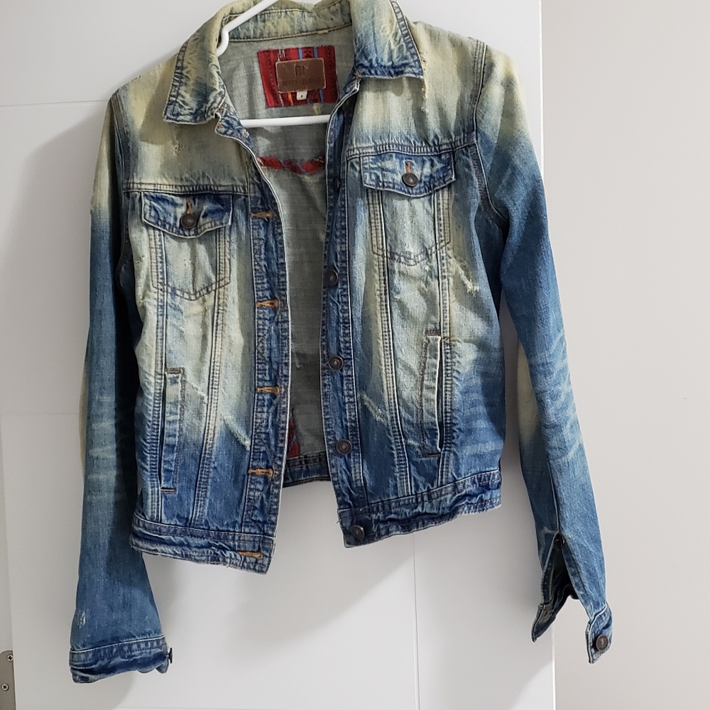 Women's distressed denim jacket